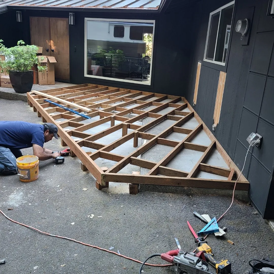 Deck frame with joists during construction