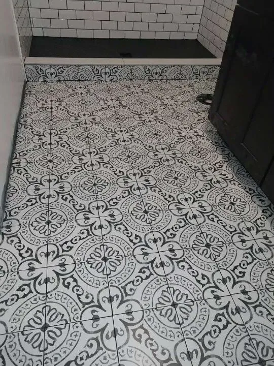 Black-and-white patterned tile bathroom floor